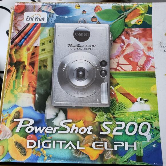 Cannon PowerShot S200 Digital Elph Camera Silver Tested Working Battery Charger - Picture 8 of 8